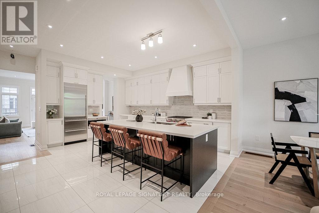 Photo 11 of 80 West Village Lane, Markham ON