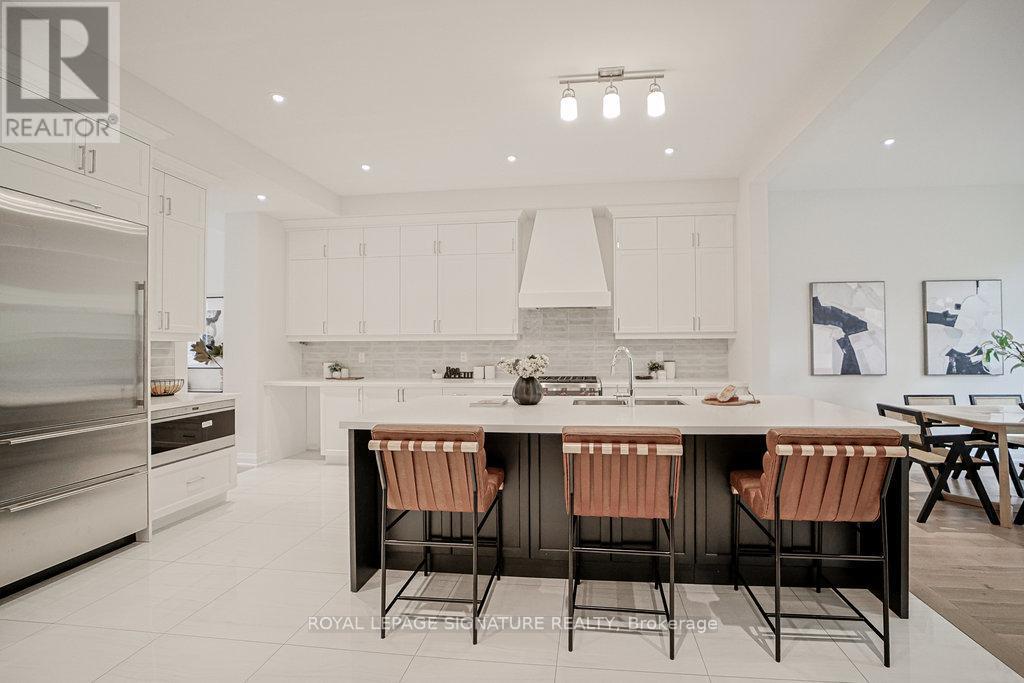 Photo 7 of 80 West Village Lane, Markham ON