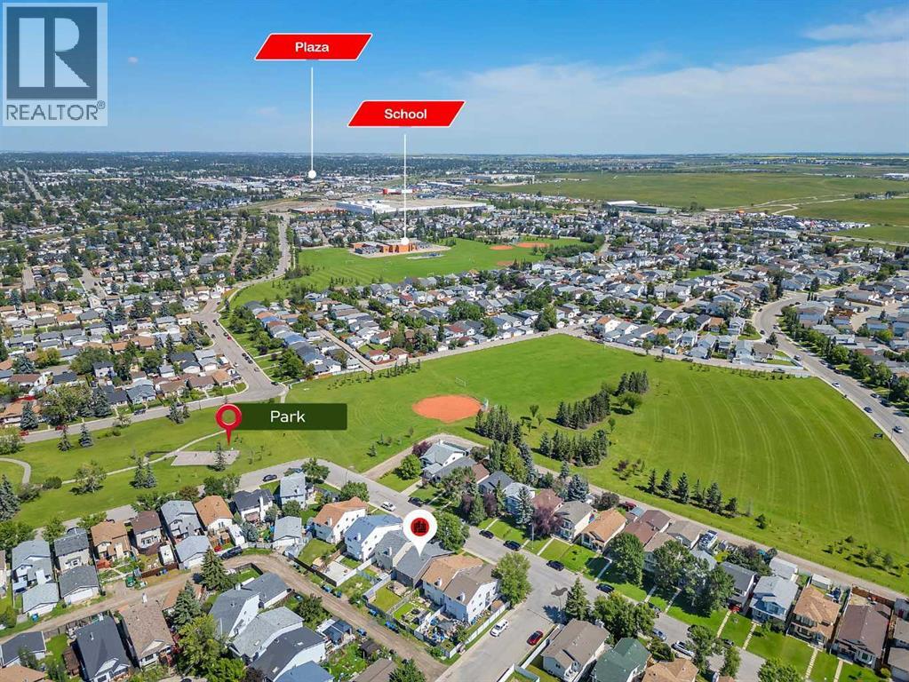 Single Family House 3 Level for Sale in  Erin Green Way SE Erin Woods Calgary 