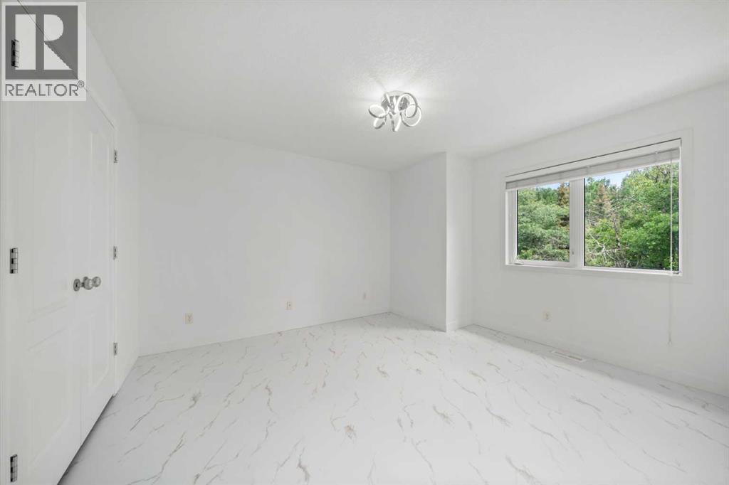 Single Family House for Sale in  Spring Willow Way SW Springbank Hill Calgary 
