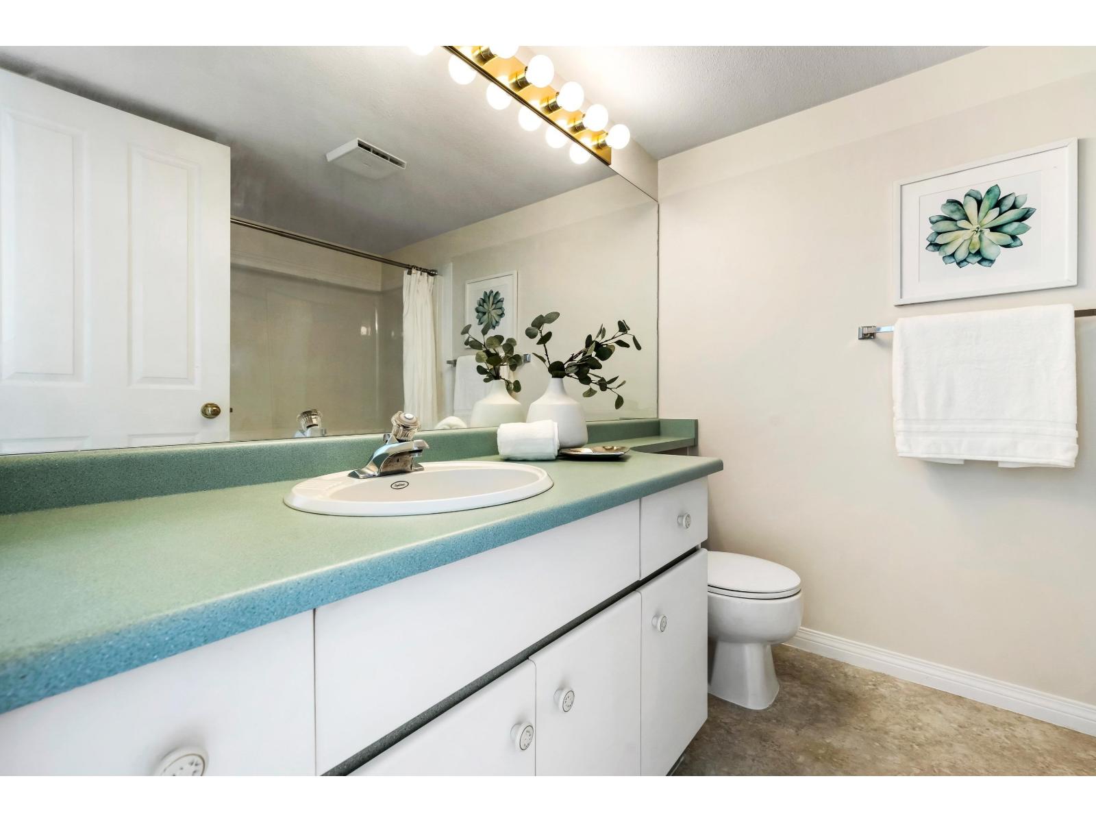 Photo 1 of 204 7685 Amber Drive Sardis West Vedder, Chilliwack BC