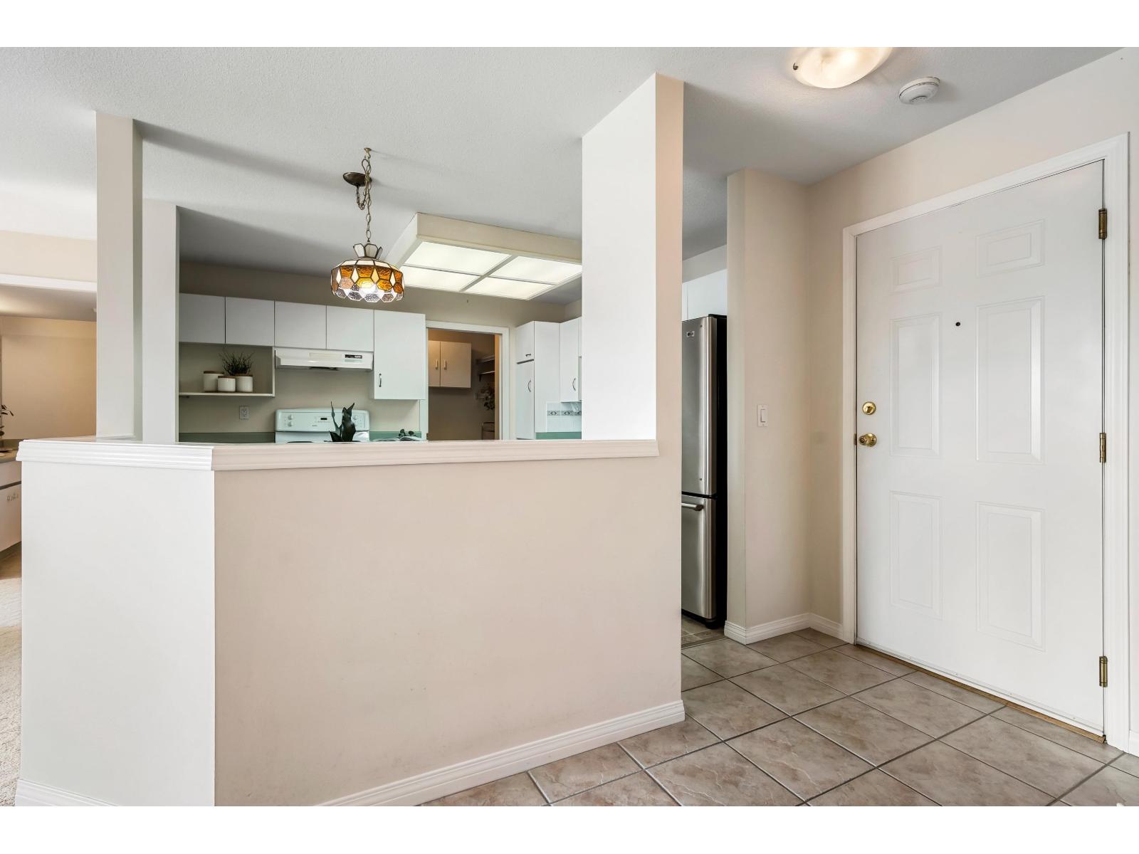 Photo 5 of 204 7685 Amber Drive Sardis West Vedder, Chilliwack BC