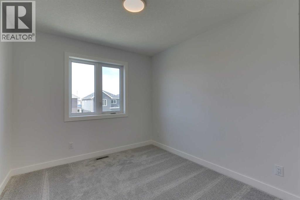 Photo 23 of 477 Hotchkiss Drive Se, Calgary AB