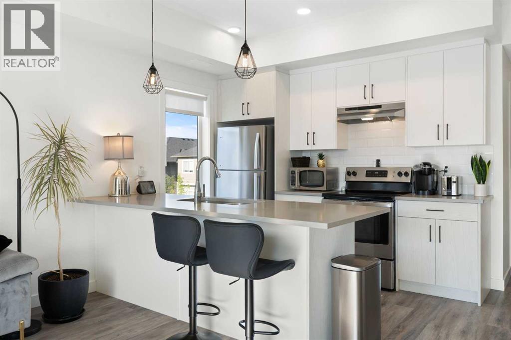 Photo 13 of 602 24 Rivercrest Drive, Cochrane AB