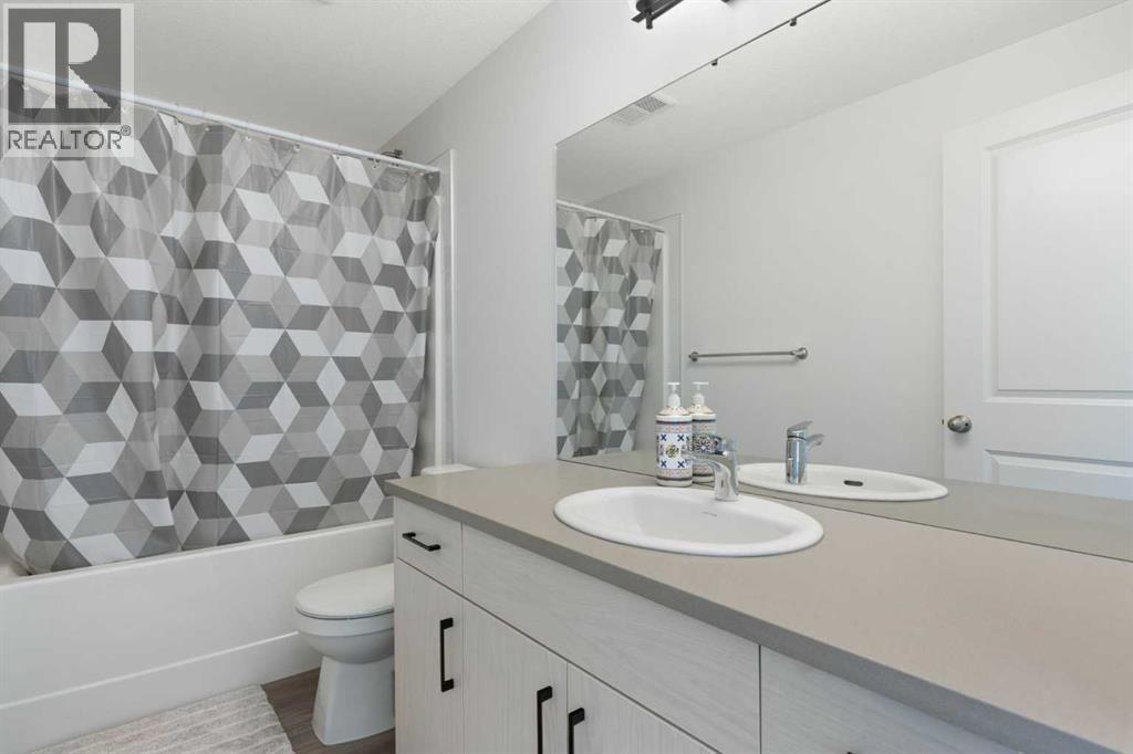Photo 18 of 602 24 Rivercrest Drive, Cochrane AB
