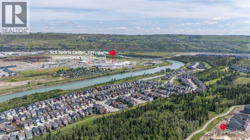 Photo 21 of 602 24 Rivercrest Drive, Cochrane AB