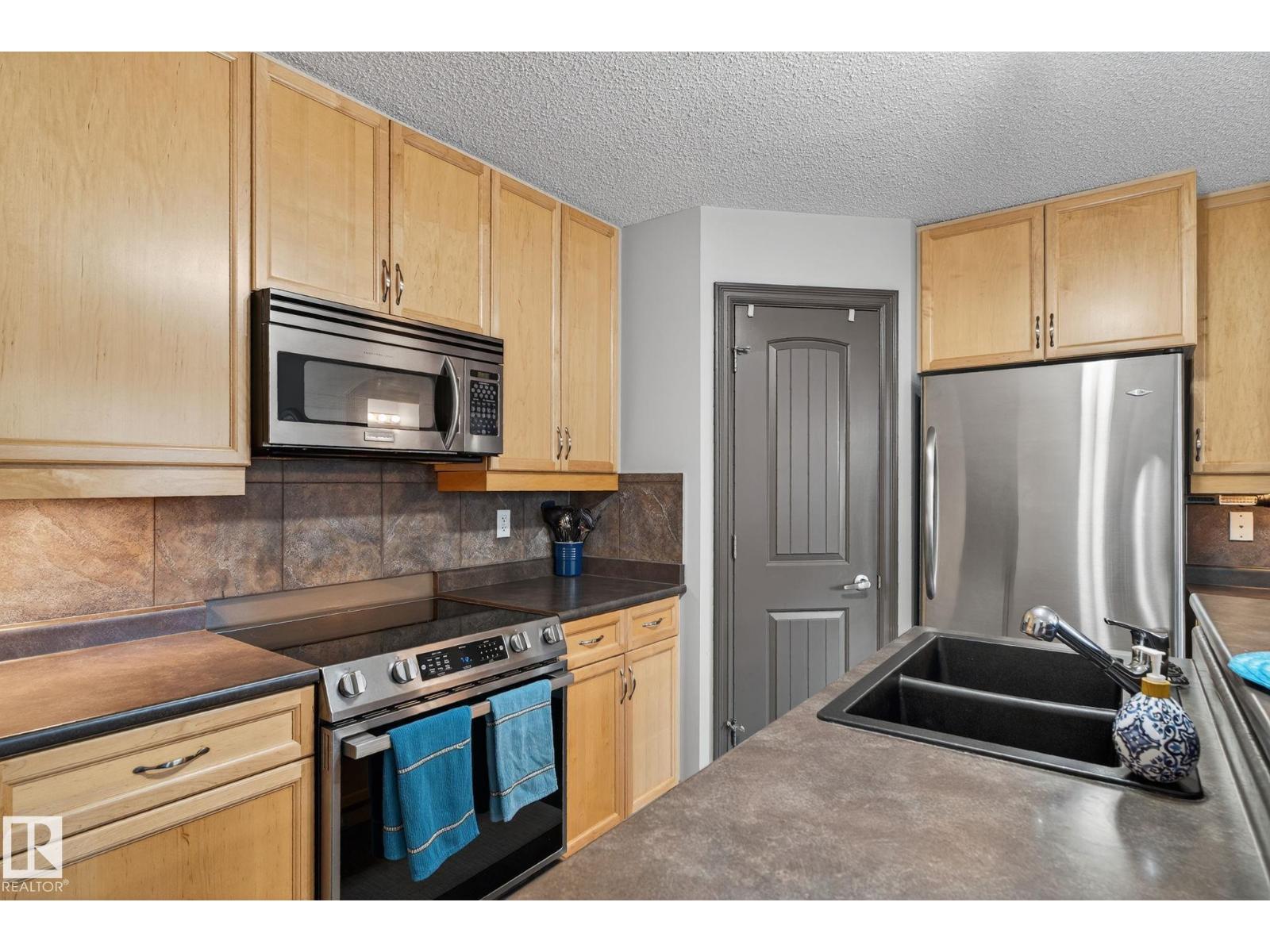 Photo 35 of 101 Keystone Ln, Leduc AB
