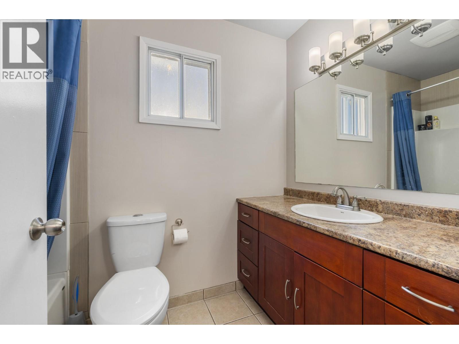 Photo 6 of 1040 Glenmore Drive, Kelowna BC