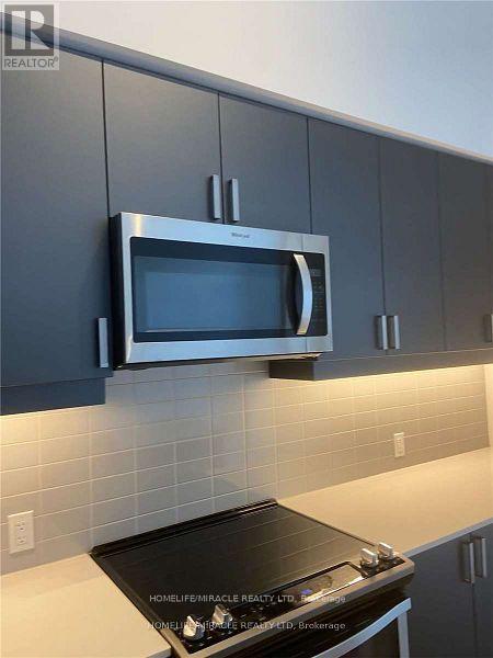 Photo 5 of Th 130 8 Nahani Way, Mississauga ON
