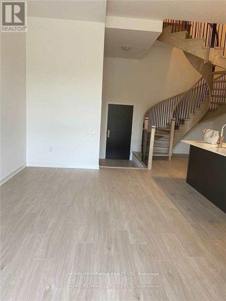 Photo 3 of Th 130 8 Nahani Way, Mississauga ON
