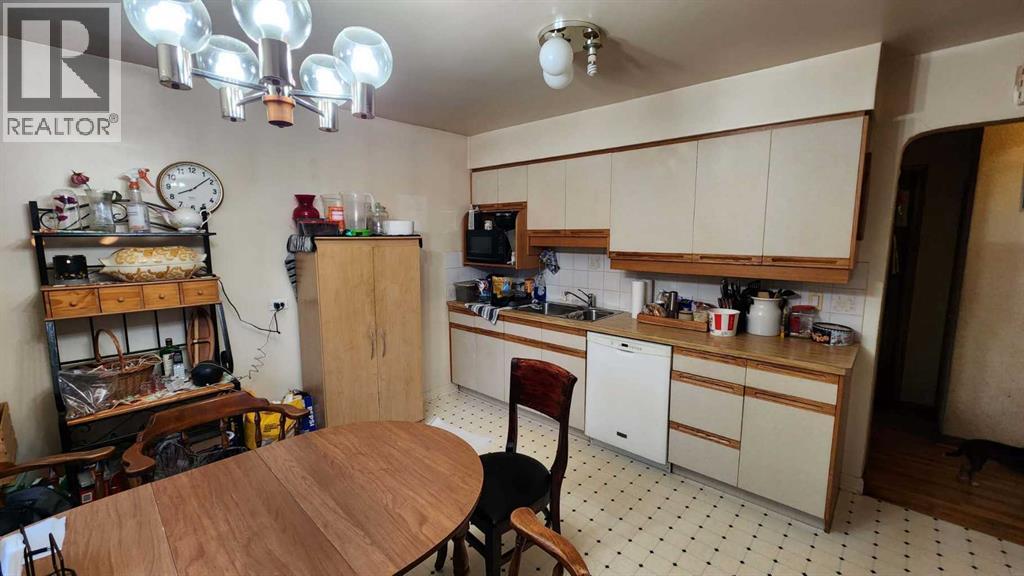 Single Family House Bungalow for Sale in   Avenue NW Banff Trail Calgary 