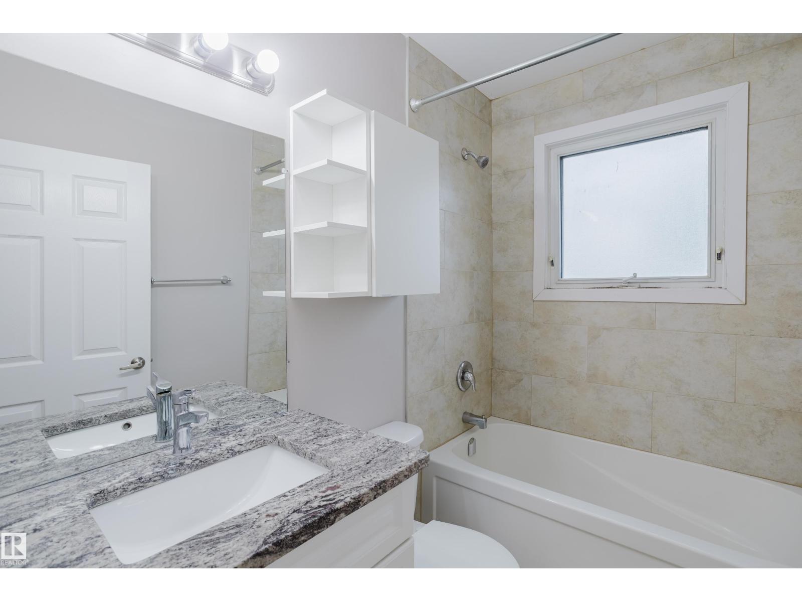 Photo 1 of 13808 135 Av Nw, Edmonton AB