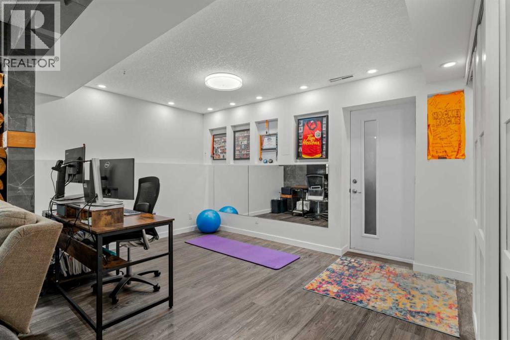 Single Family House Bi-level for Sale in  Bearspaw Drive NW Brentwood Calgary 