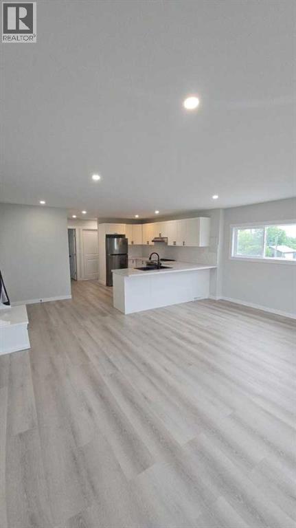 Photo 2 of 9513 108 Avenue, Grande Prairie AB