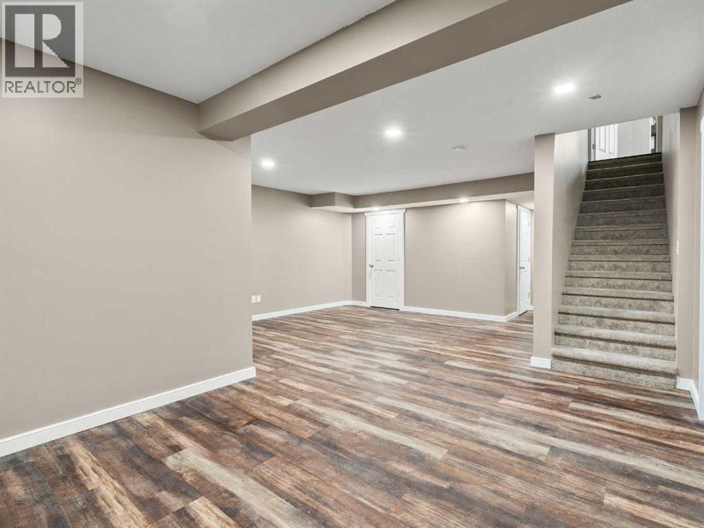 Photo 10 of 169 Cimarron Drive, Okotoks AB