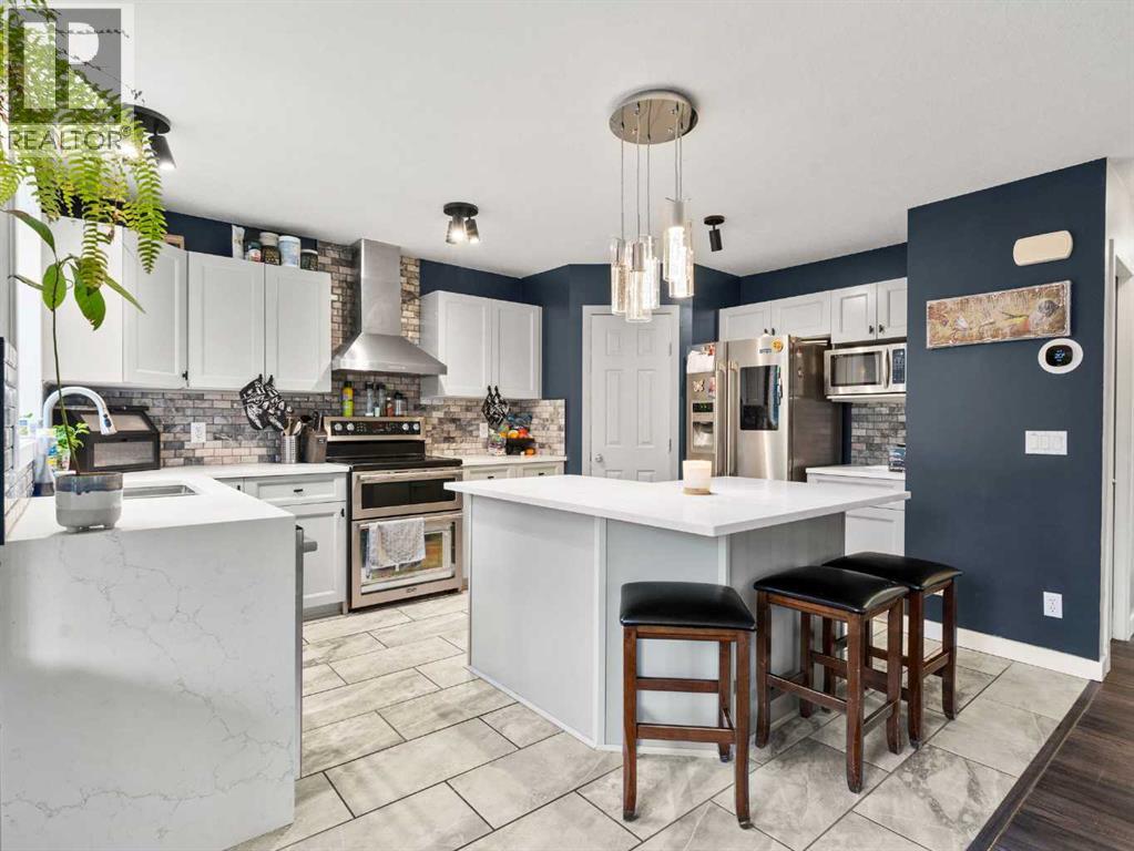 Photo 20 of 169 Cimarron Drive, Okotoks AB