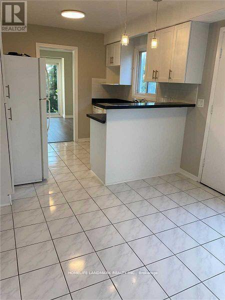 Photo 7 of Upper 120 Micmac Crescent, Toronto ON