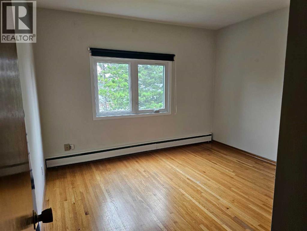 Multi-family House for Sale in   Street NW Banff Trail Calgary 
