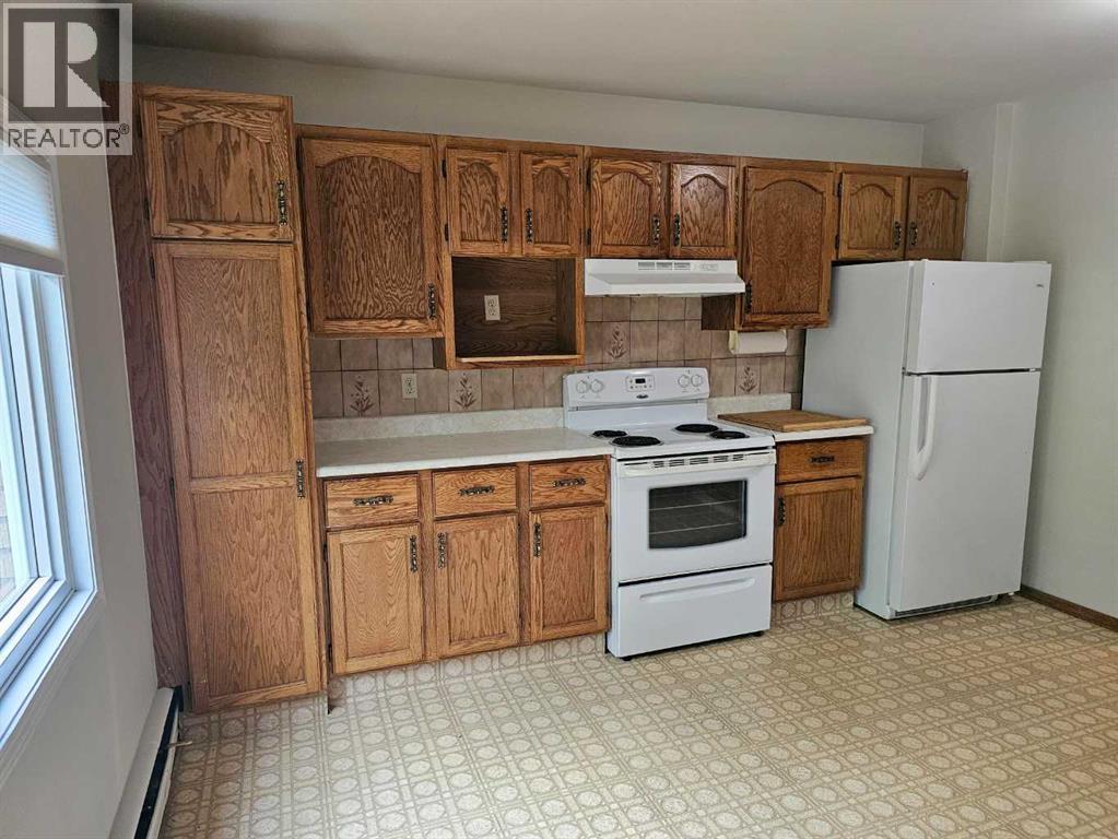 Multi-family House for Sale in   Street NW Banff Trail Calgary 