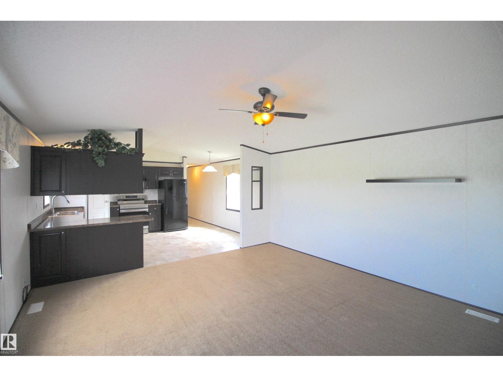 Photo 6 of 41 5220 44 Av, Calmar AB