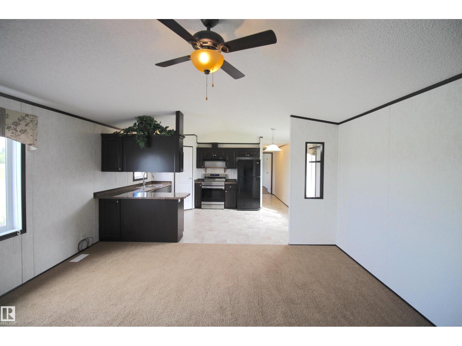 Photo 10 of 41 5220 44 Av, Calmar AB