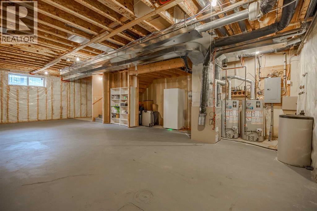 Single Family House for Sale in  Ypres Green SW Garrison Woods Calgary 