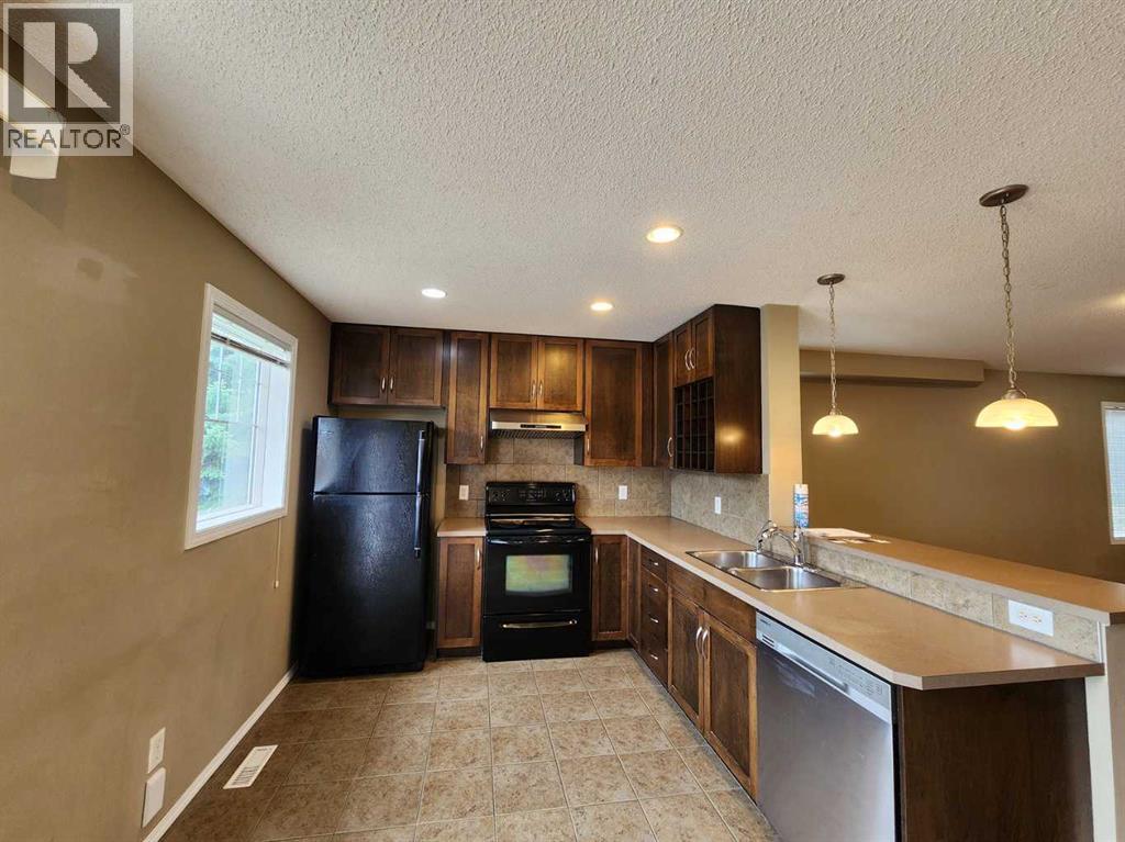 Single Family House for Sale in  Country Village Gate NE Country Hills Village Calgary 