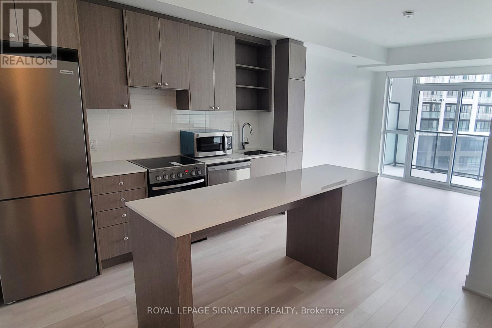 Photo 4 of 510 50 George Butchart Drive, Toronto ON