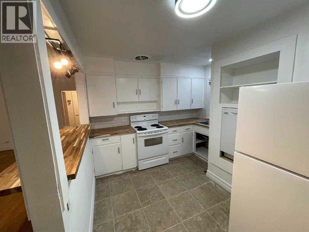 Single Family House Bungalow for Sale in  A Street S Victoria Park Lethbridge 