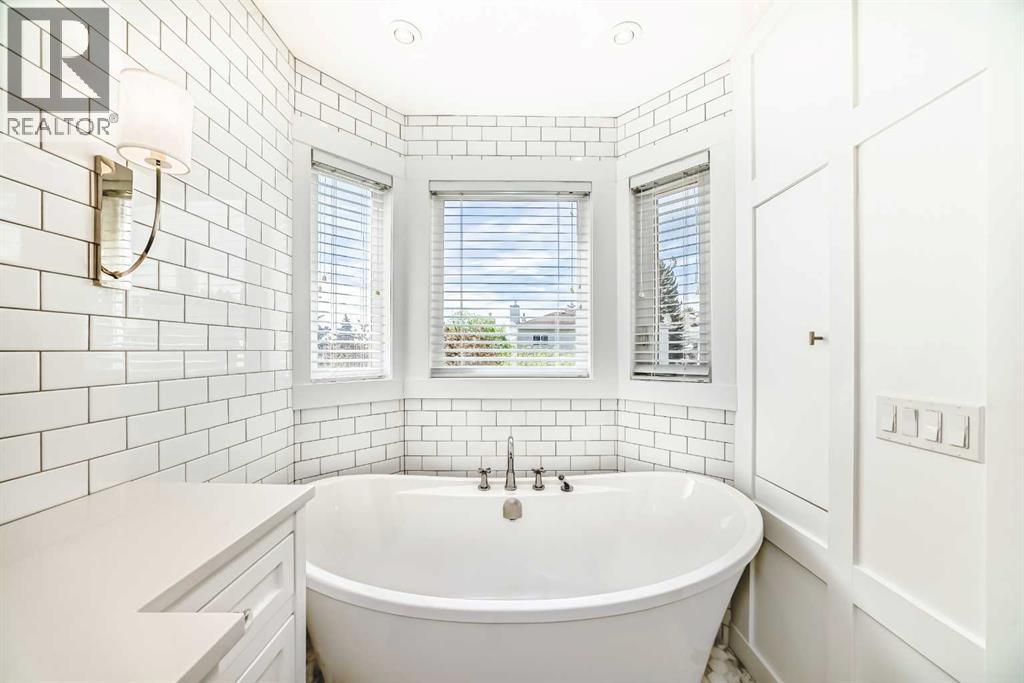 Single Family House 4 Level for Sale in  Signal Hill Place SW Signal Hill Calgary 