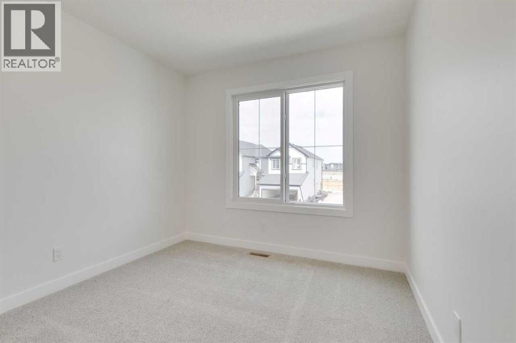 Photo 13 of 612 Buffaloberry Manor Se, Calgary AB