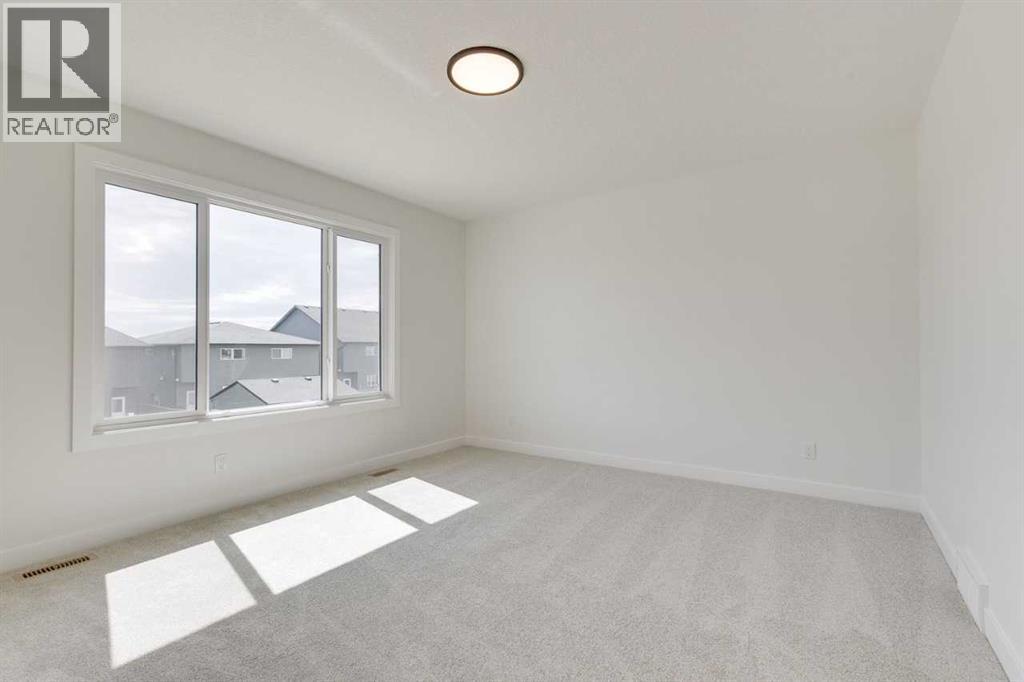 Photo 9 of 612 Buffaloberry Manor Se, Calgary AB