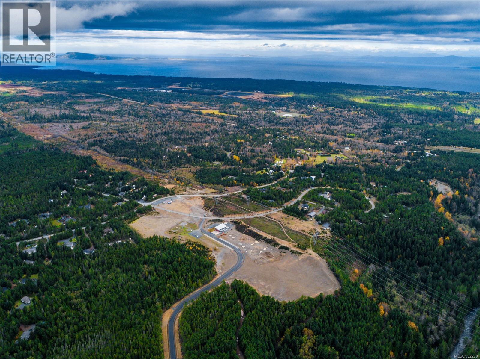 Photo 2 of 3 Ashling Rd, Qualicum Beach BC