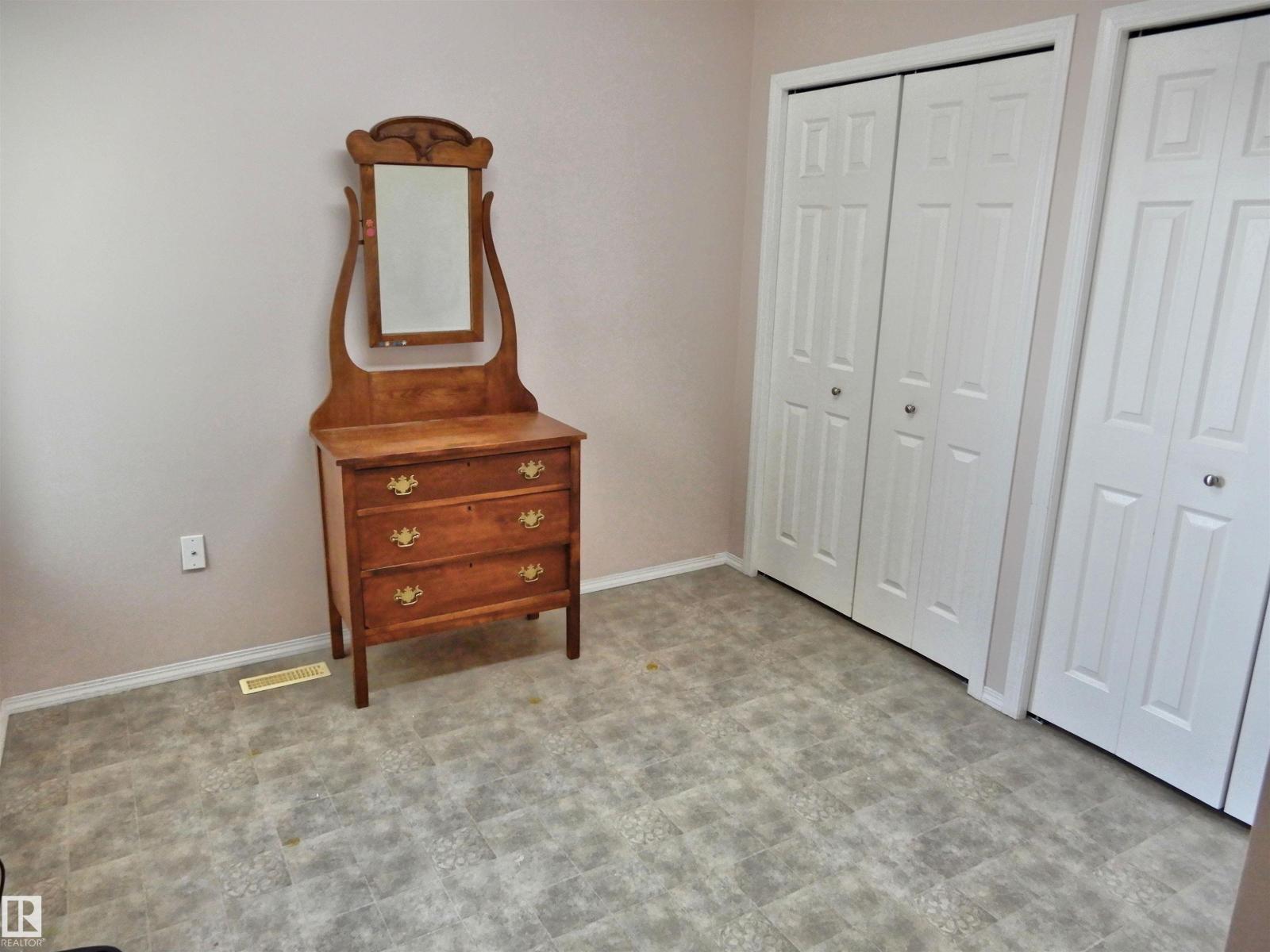 Photo 11 of 10111 105 St, Morinville AB