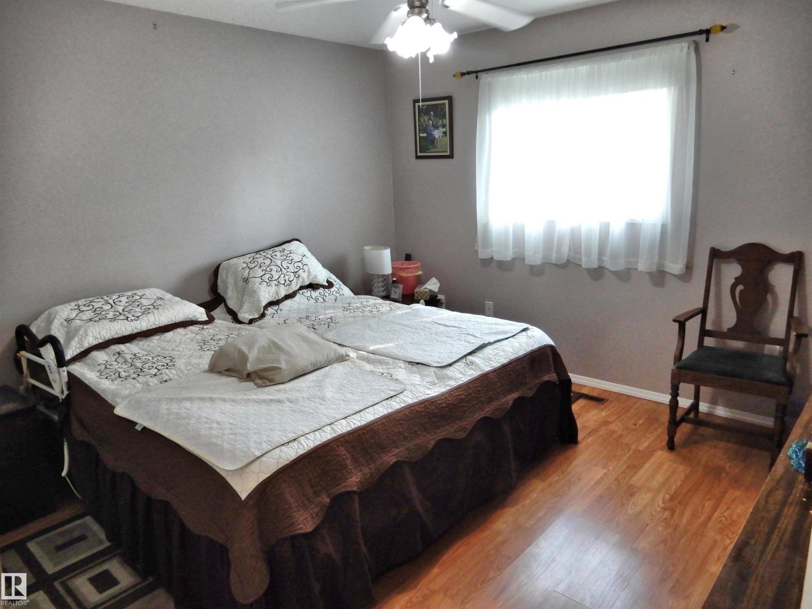 Photo 9 of 10111 105 St, Morinville AB