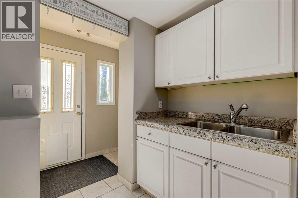Single Family House 4 Level for Sale in  Glasgow Drive SW Glendale Calgary 
