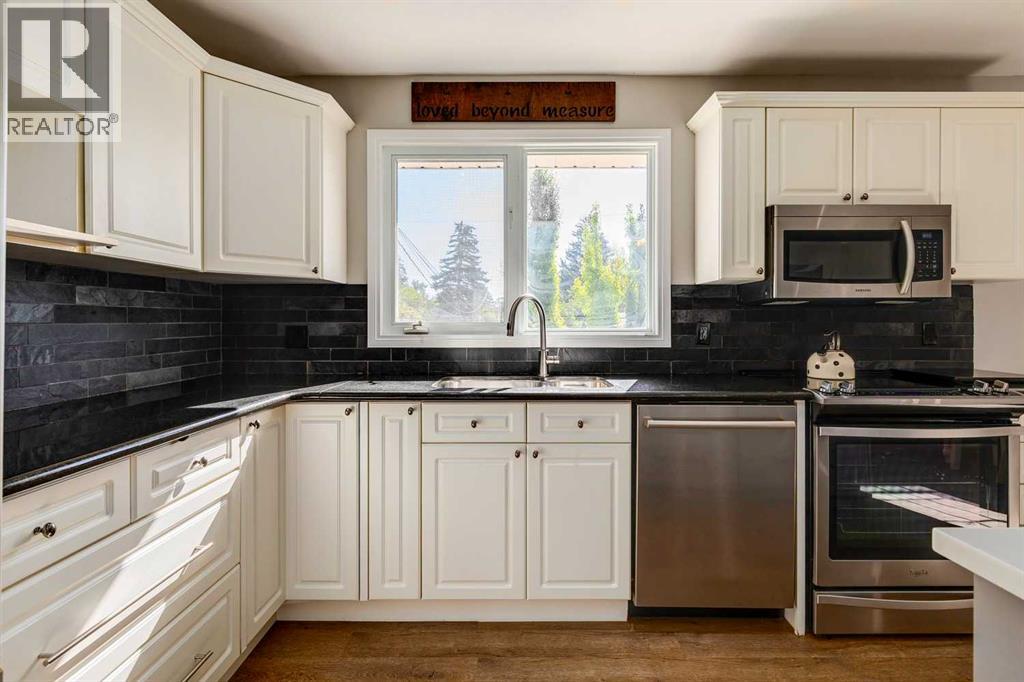 Single Family House 4 Level for Sale in  Glasgow Drive SW Glendale Calgary 