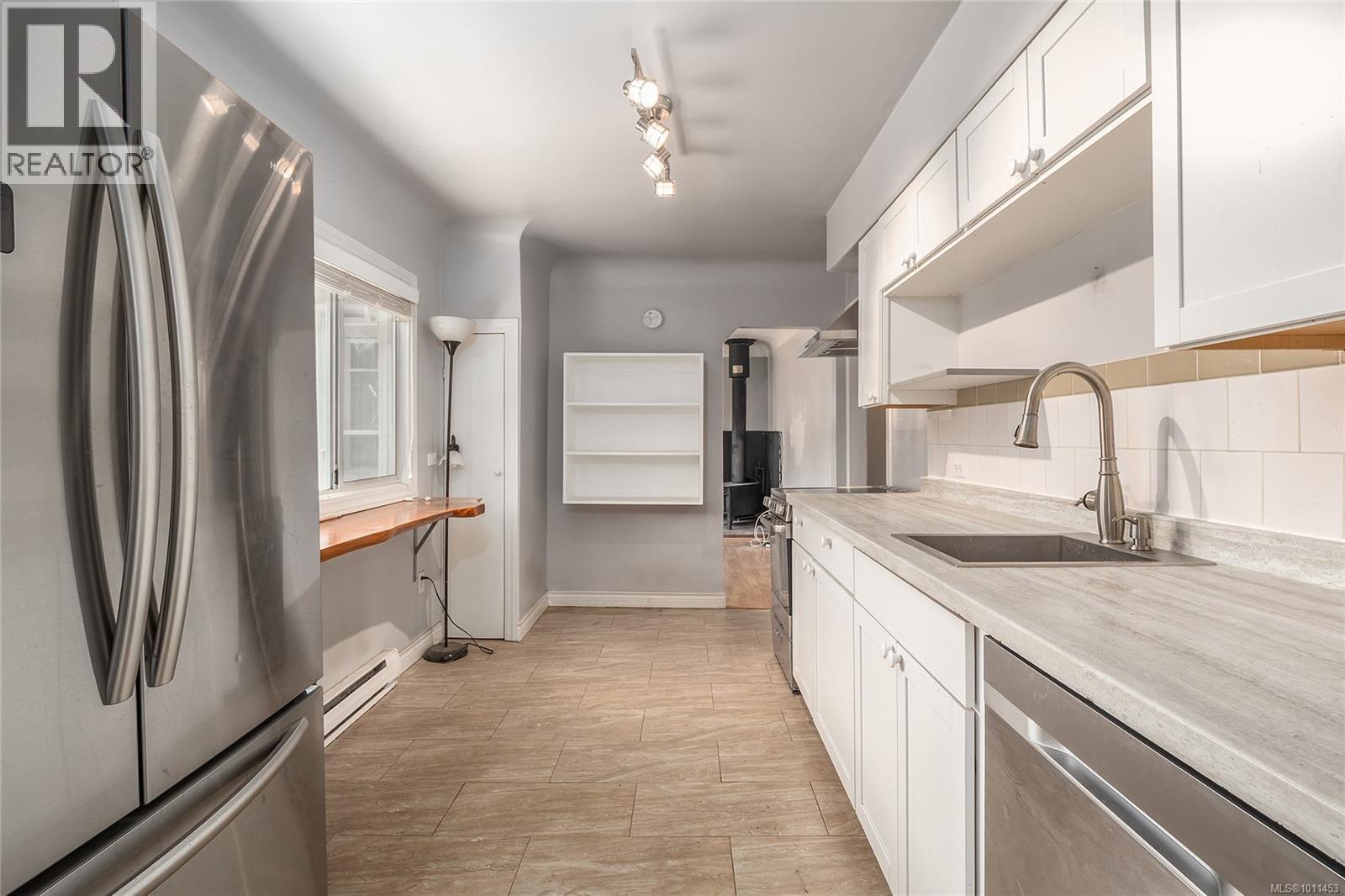 Photo 11 of 2628 Sooke Rd, Langford BC