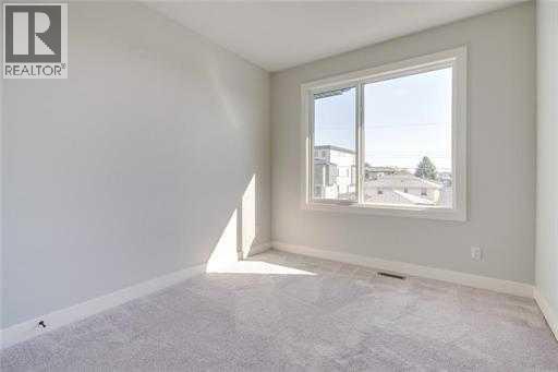 Single Family House for Sale in  Burns Avenue SE Ramsay Calgary 