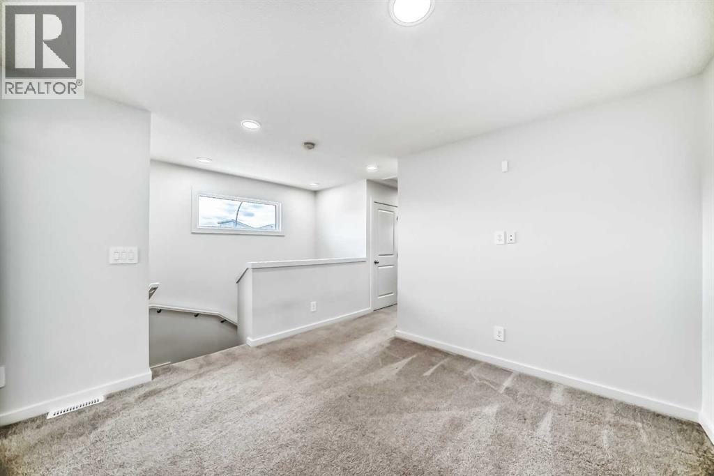 Single Family House for Sale in  Belmont Drive SW Belmont Calgary 