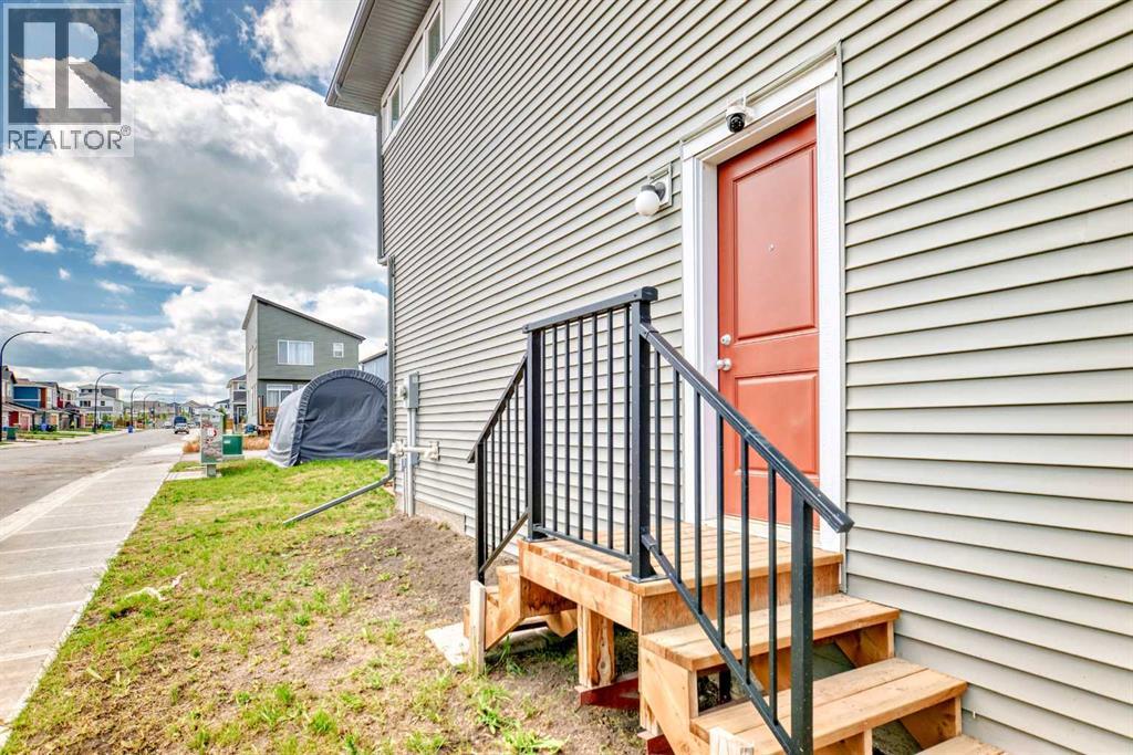 Single Family House for Sale in  Belmont Drive SW Belmont Calgary 