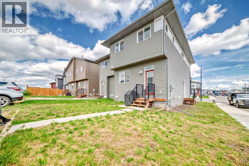 Single Family House for Sale in  Belmont Drive SW Belmont Calgary 