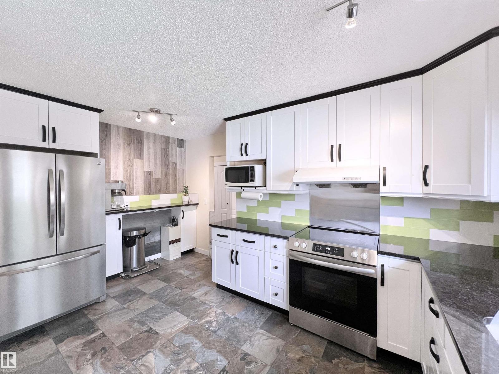 Photo 12 of 11440 Malmo Rd Nw, Edmonton AB