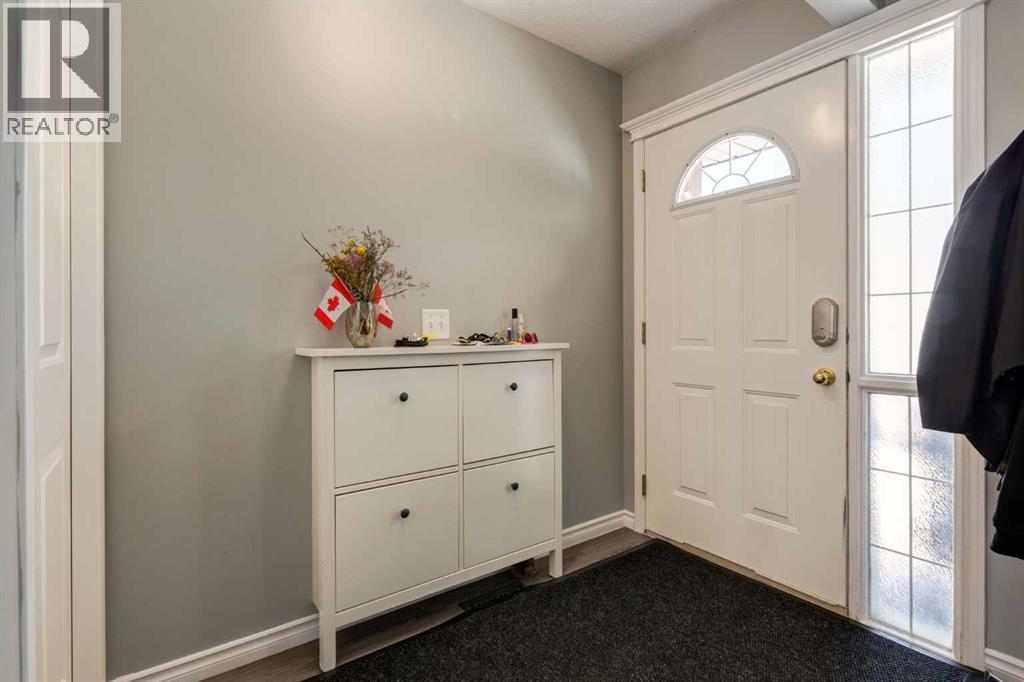 Photo 2 of 5 135 Bow Ridge Drive, Cochrane AB