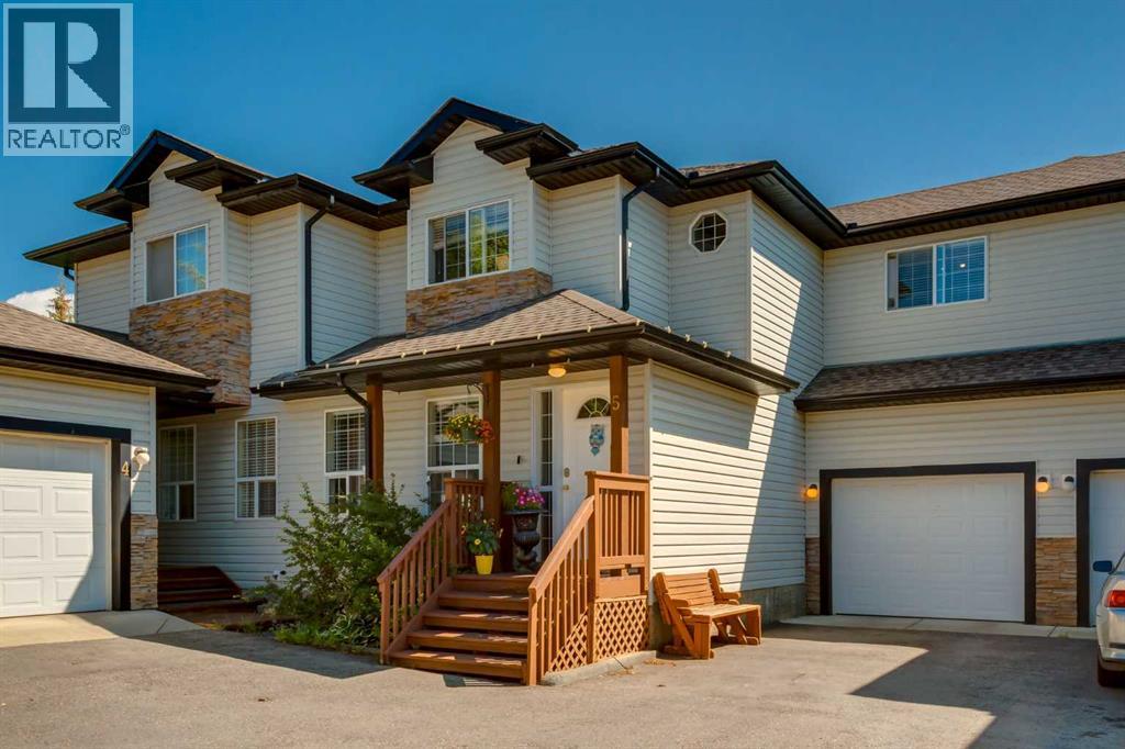 Photo 1 of 5 135 Bow Ridge Drive, Cochrane AB
