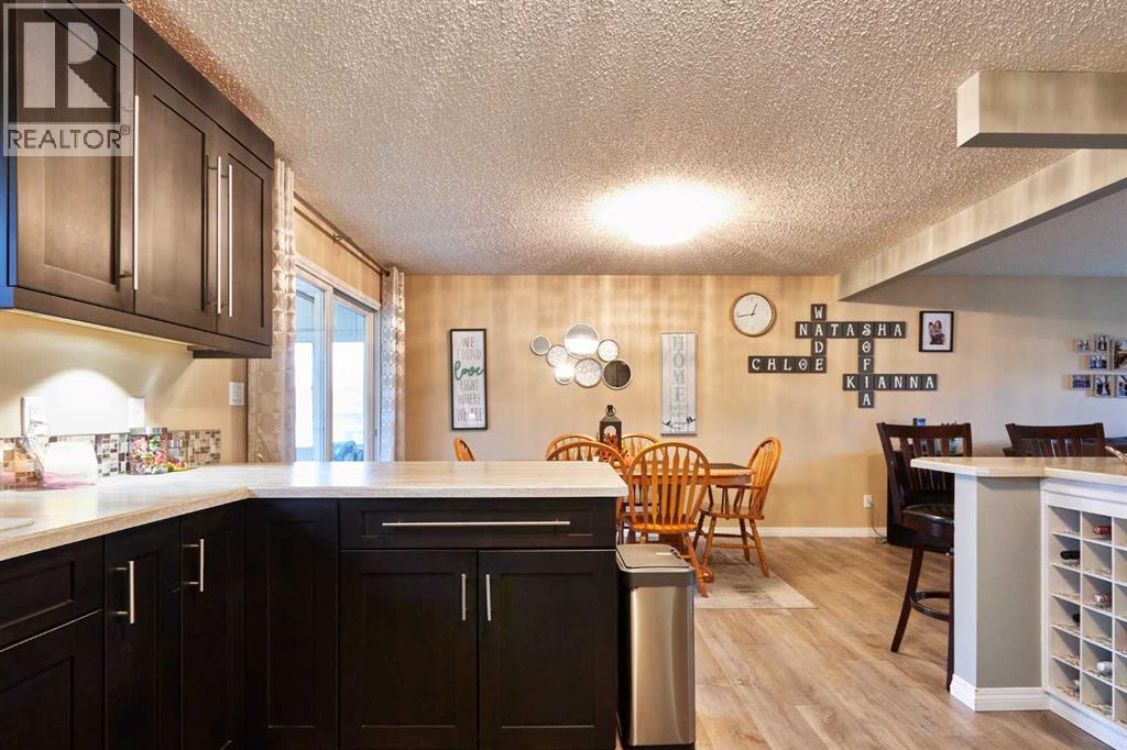Single Family House Bi-level for Sale in  Iris Court SE Connaught Medicine Hat 