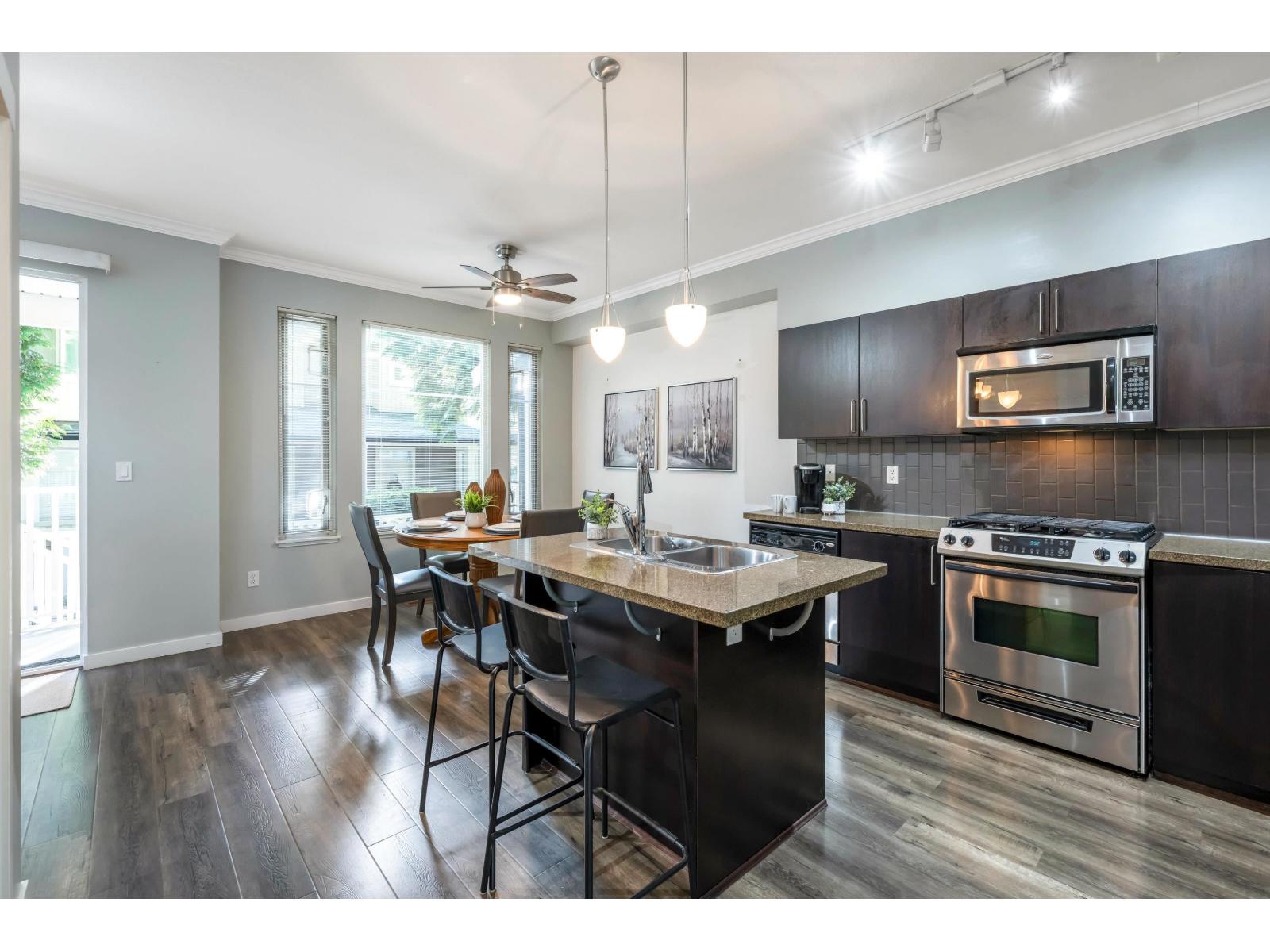 Photo 11 of 99 6575 192 Street, Surrey BC