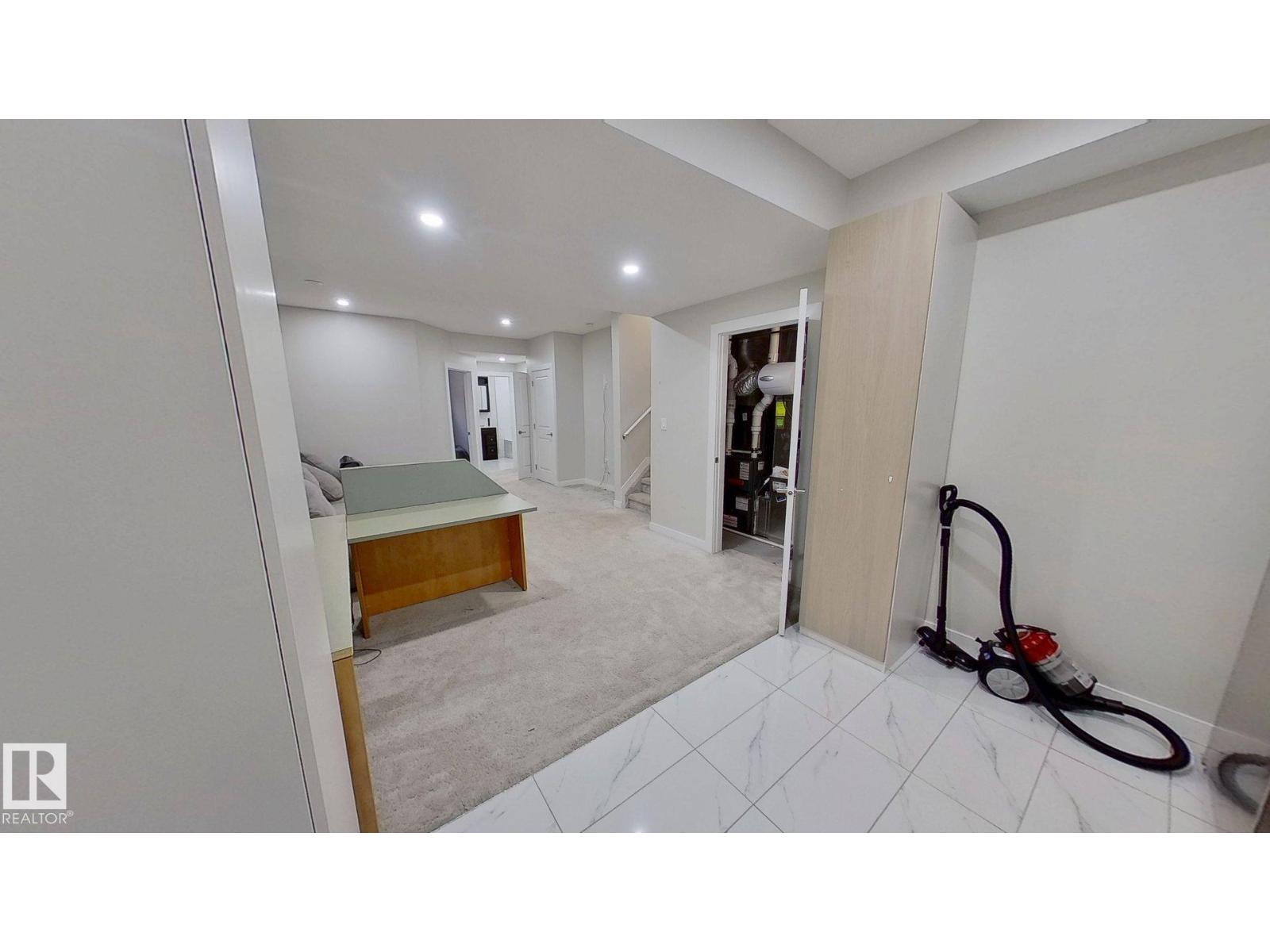 Photo 6 of 9876 206 St Nw, Edmonton AB