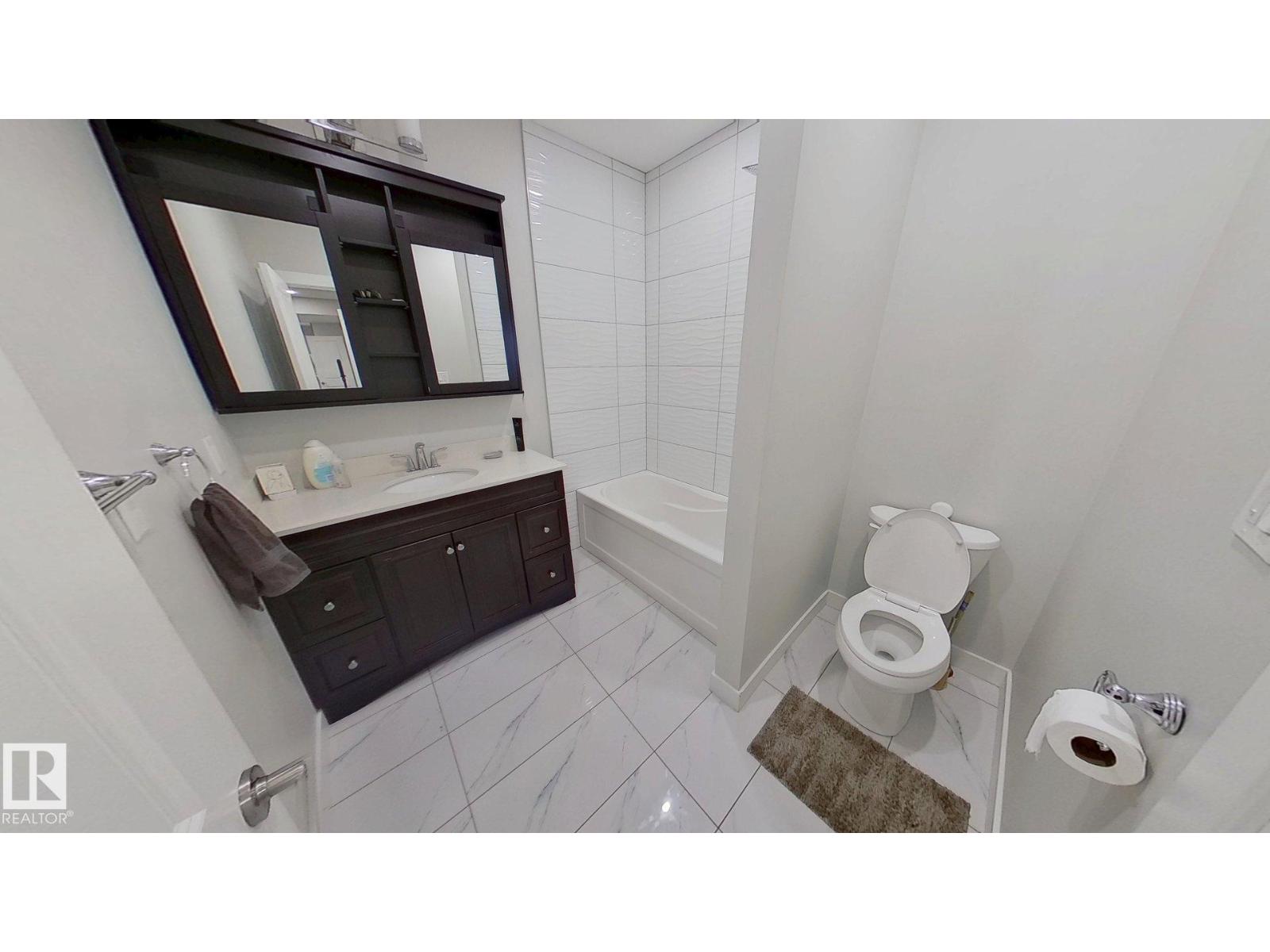 Photo 16 of 9876 206 St Nw, Edmonton AB
