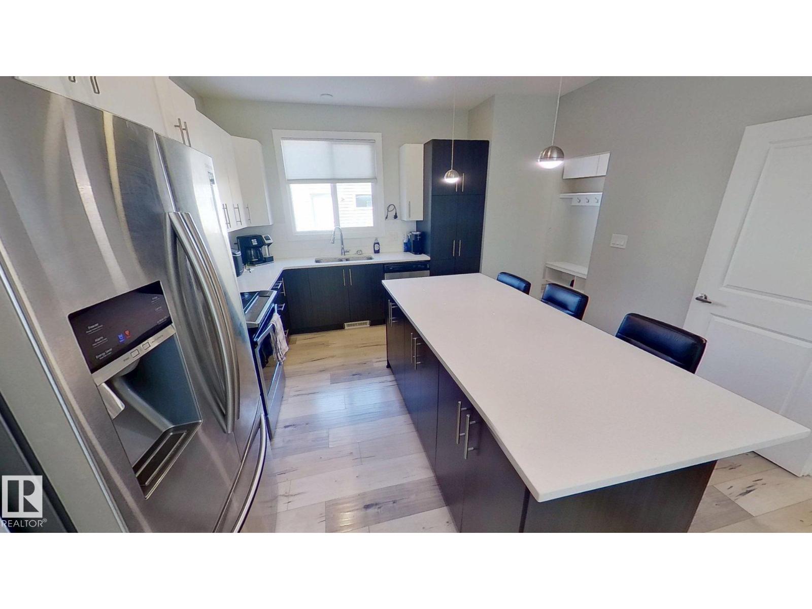 Photo 9 of 9876 206 St Nw, Edmonton AB
